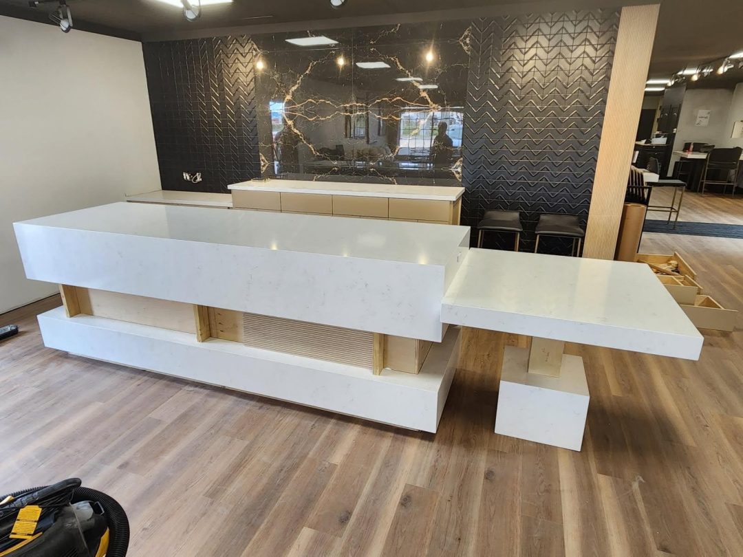 Quartz Countertop Installation Cost: Key Factors Involved beautiful modern white quartz countertop island installation