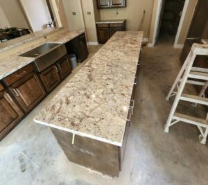 special block | R&D Marble, Inc. warm and traditional kitchen island with quartz countertop