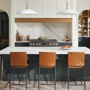 CalacattaGoldTERACANTOBYLXHAUSYSCollection | R&D Marble, Inc. Interior view of a porcelain surface kitchen island in the shade Calacatta Gold Teracanto by LX Hausys Collection.