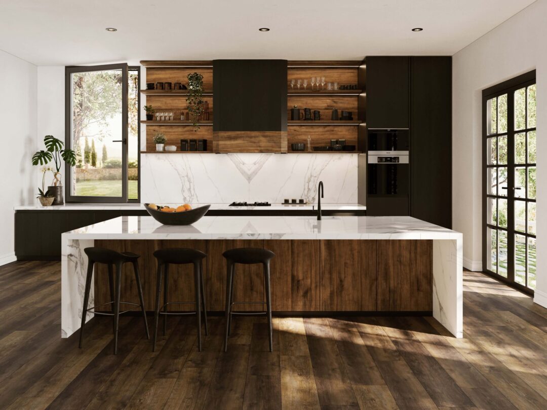 Interior view of a luxury kitchen with a Teracanto porcelain island, countertops, and backsplash in the shade Statuario Bianco by LX Hausys.