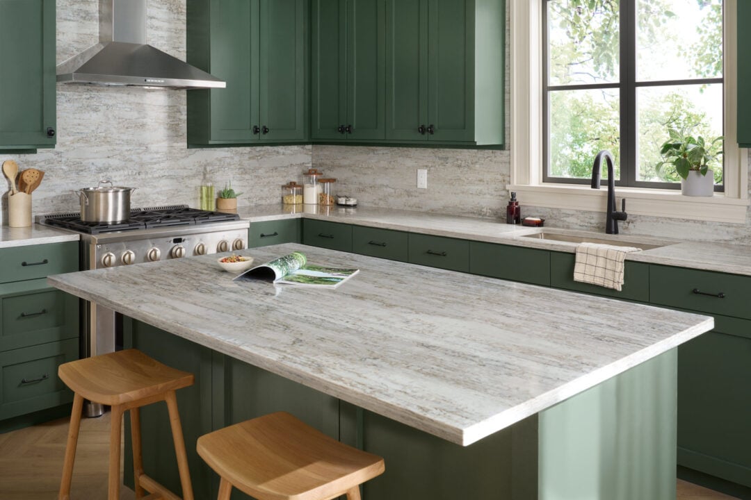 What Is An Eased Edge Countertop? Materials & Benefits A green kitchen with a Viatera quartz eased edge kitchen island.