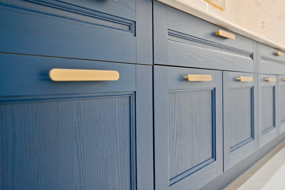 Preparing Cabinets for Granite Countertops Dark blue furniture is stylish and timeless.