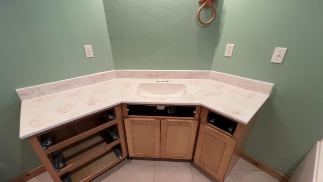 Marble Bathroom Countertops: Design Ideas & Benefits Freshly installed marble bathroom countertops for a custom vanity area.